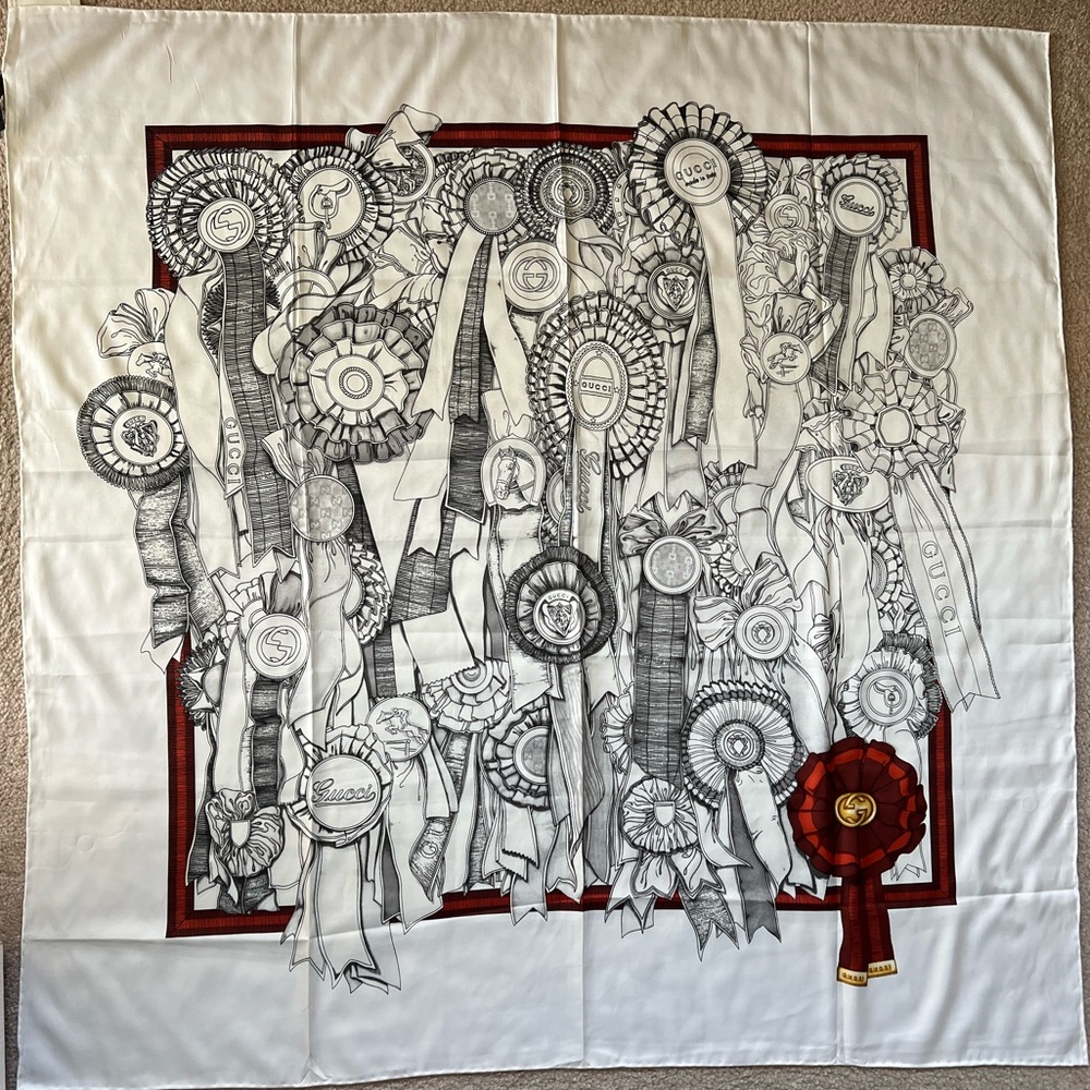 Gucci hand rolled edges silk scarf.